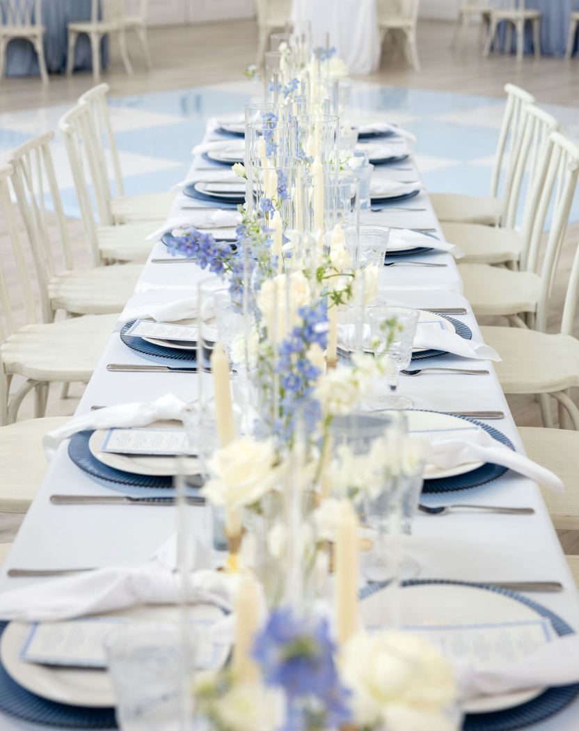 Blue and white wedding reception tablescape