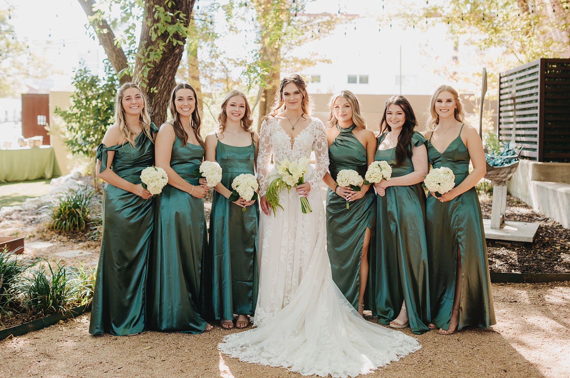 Bride with bridesmaids in green dresses