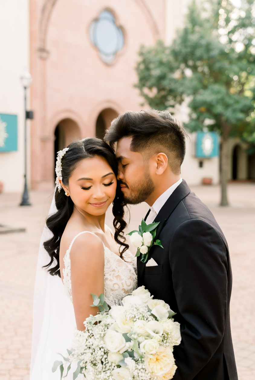 Wedding couple portrait with white bouquet