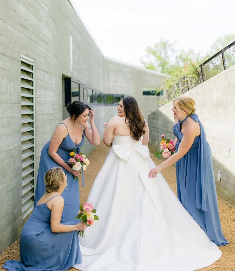 Bride with bridesmaids in blue dresses