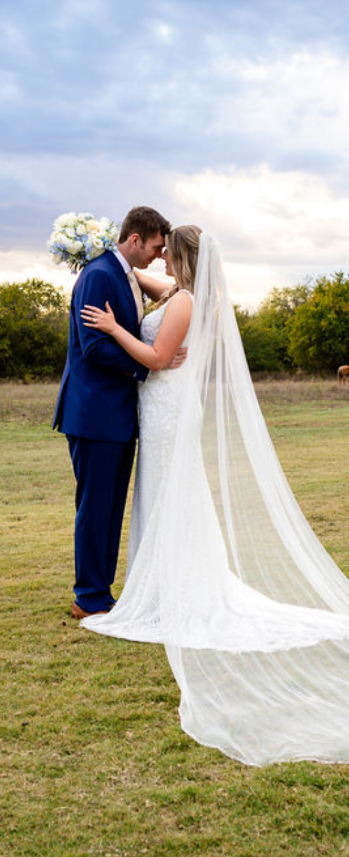 Wedding couple portrait with soft florals